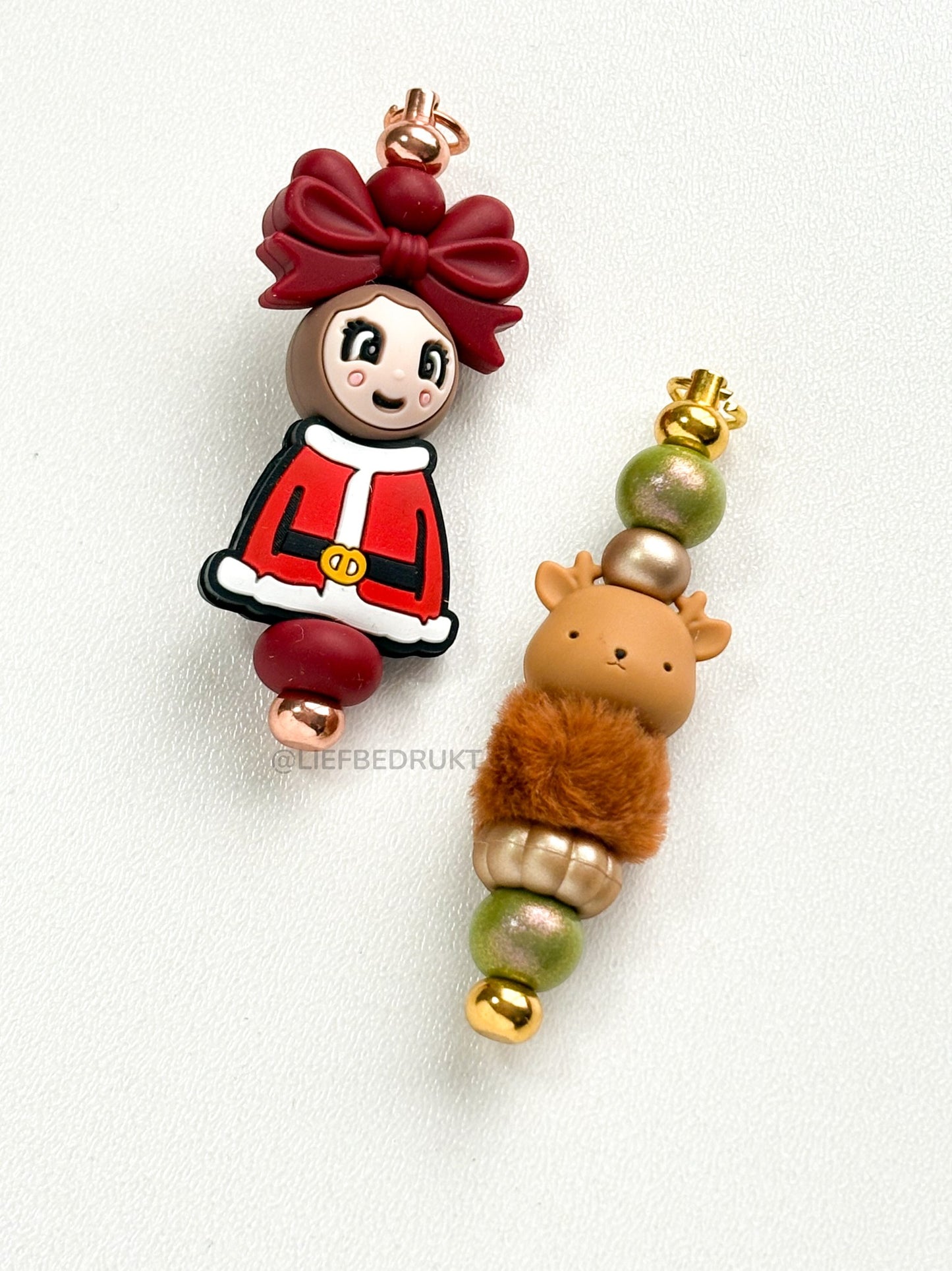 Kerstsleutelhanger met kerstvrouwtje of rendier