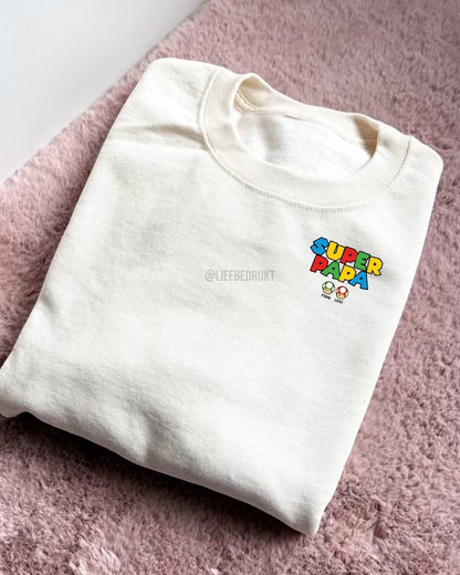 Sweater of hoodie voor “SUPER PAPA/MAMA” met naam/namen