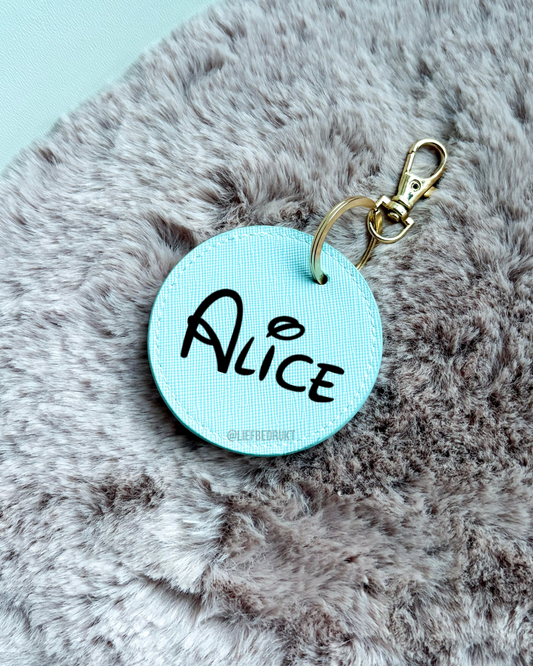 Sleutelhanger rond met naam of tekst  – lederlook
