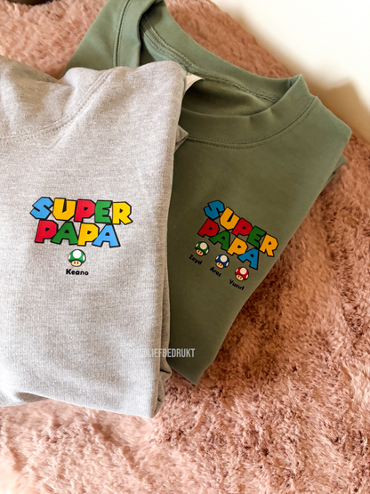 Sweater of hoodie voor “SUPER PAPA/MAMA” met naam/namen