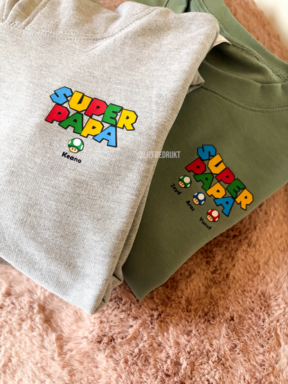 Sweater of hoodie voor “SUPER PAPA/MAMA” met naam/namen
