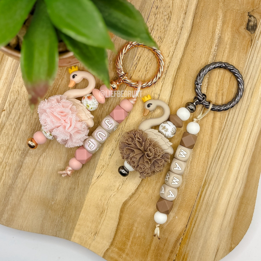 Gepersonaliseerde zwanen sleutelhanger