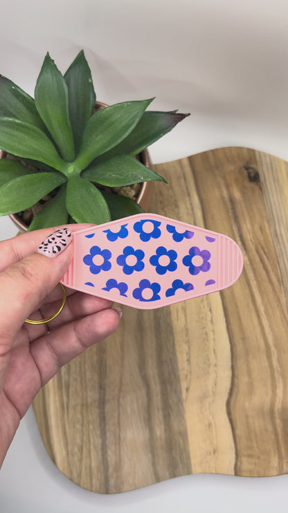 Sleutelhanger met holografische bloemen- hard plastiek